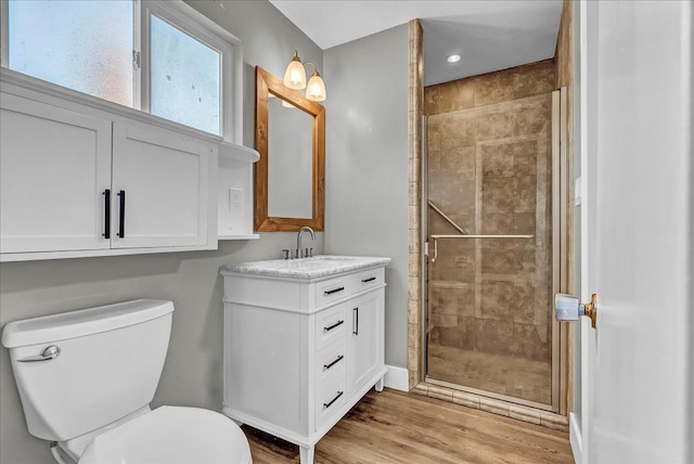 1408 S Hope Ave, Reedley, CA 93654 - full bathroom with vanity, a stall shower, and wood finished floors