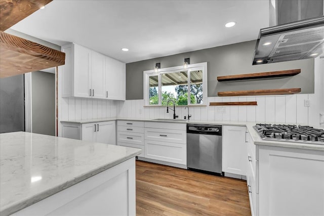 1408 S Hope Ave, Reedley, CA 93654 - kitchen featuring appliances with stainless steel finishes, open shelves, recessed lighting, white cabinets, and light stone countertops