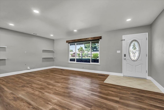 1408 S Hope Ave, Reedley, CA 93654 - entryway with healthy amount of natural light, wood finished floors, and recessed lighting