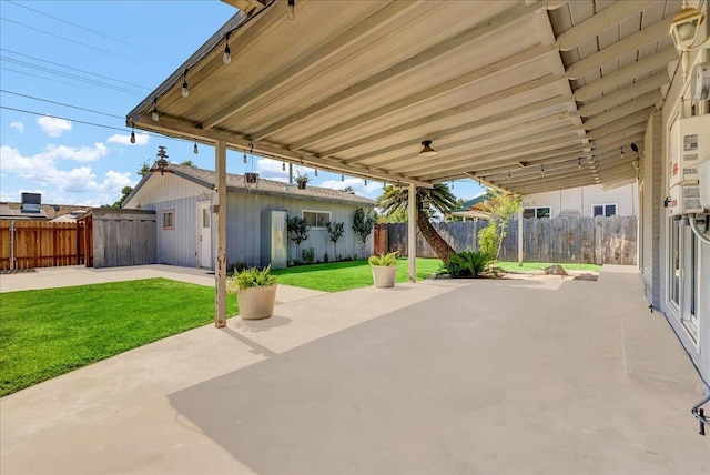 1408 S Hope Ave, Reedley, CA 93654 - fenced backyard with a patio