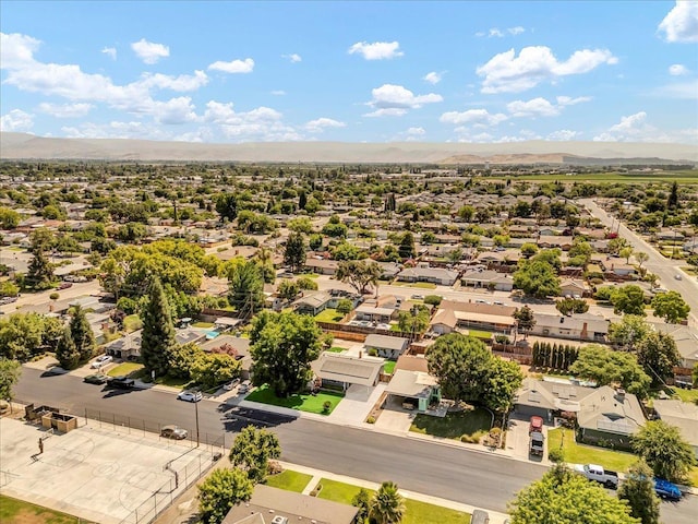 1408 S Hope Ave, Reedley, CA 93654 - aerial perspective of suburban area featuring a mountainous background