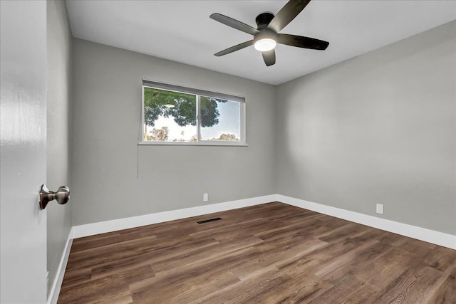 1408 S Hope Ave, Reedley, CA 93654 - unfurnished room with ceiling fan and dark wood-style flooring