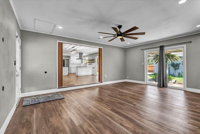 1408 S Hope Ave, Reedley, CA 93654 - spare room featuring wood finished floors, ornamental molding, recessed lighting, and ceiling fan