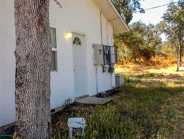 34937 Bronco Ln, Yokuts Valley, CA 93675 - view of property exterior with stucco siding