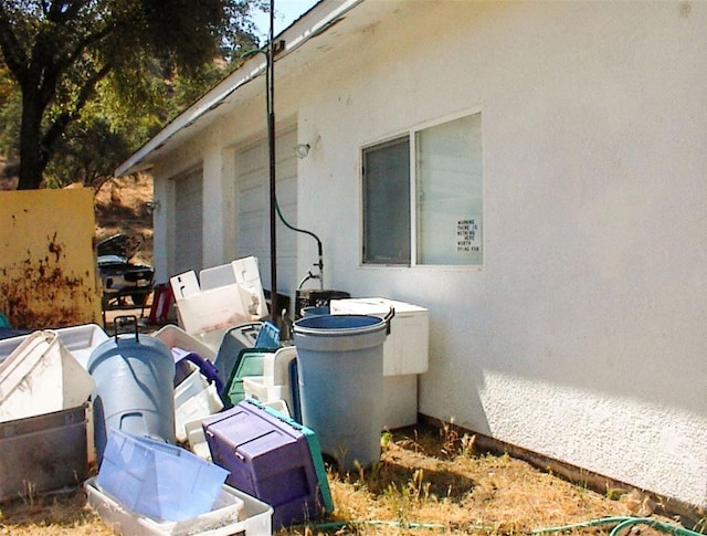 34937 Bronco Ln, Yokuts Valley, CA 93675 - view of property exterior featuring stucco siding