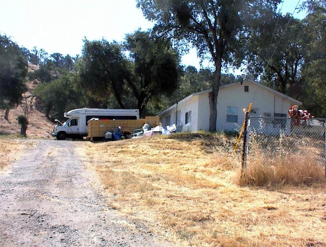 34937 Bronco Ln, Yokuts Valley, CA 93675 - view of dirt / gravel driveway