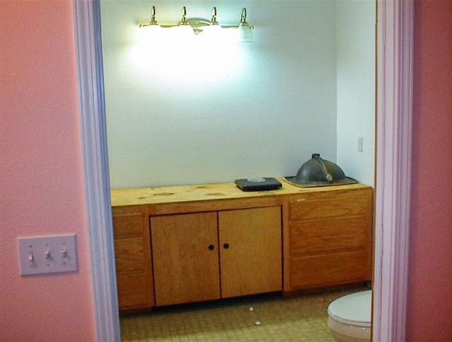 34937 Bronco Ln, Yokuts Valley, CA 93675 - bathroom featuring toilet