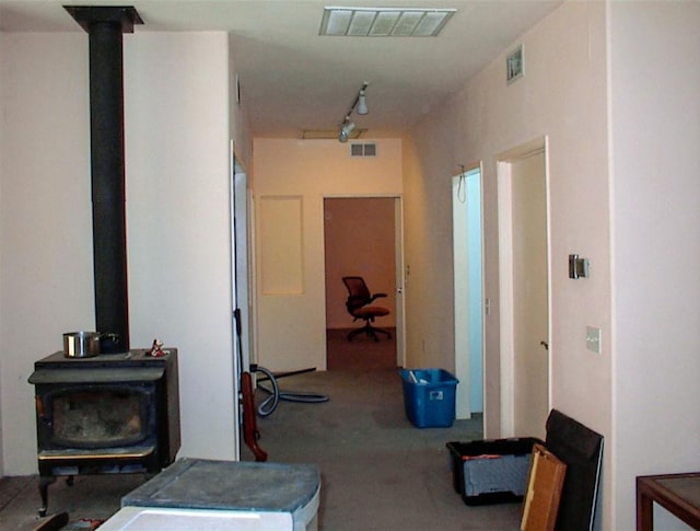 34937 Bronco Ln, Yokuts Valley, CA 93675 - corridor with carpet flooring and rail lighting