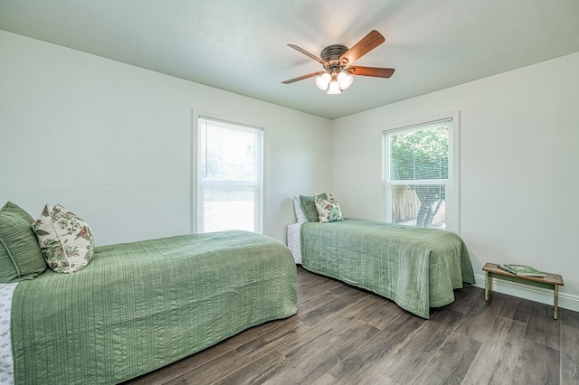 927 W Pico Ave, Fresno, CA 93705 - bedroom featuring multiple windows, wood finished floors, and a ceiling fan