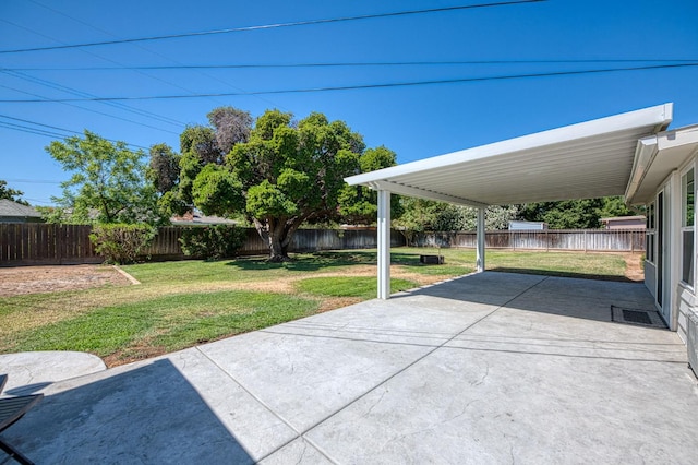 927 W Pico Ave, Fresno, CA 93705 - fenced backyard with a patio and a carport