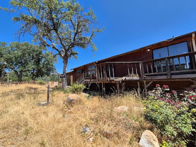 55766 Quail Hollow Ct, North Fork, CA 93643 - rear view of house featuring a wooden deck