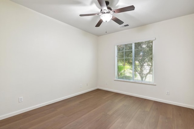 1158 E Hogan Ave, Fresno, CA 93730 - empty room featuring wood finished floors and ceiling fan