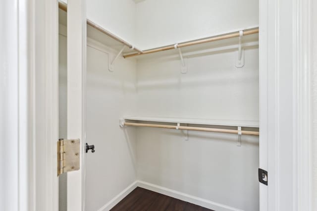 1158 E Hogan Ave, Fresno, CA 93730 - spacious closet with dark wood-style flooring