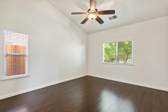 1158 E Hogan Ave, Fresno, CA 93730 - unfurnished room with vaulted ceiling, dark wood-style floors, and a ceiling fan