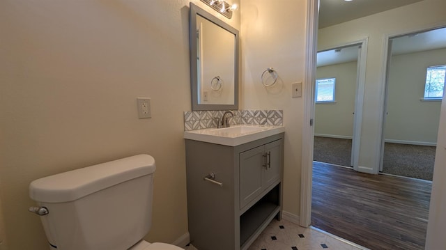 1405 N Lake St, Madera, CA 93638 - bathroom featuring vanity and decorative backsplash