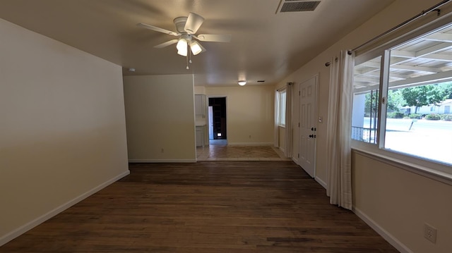 1405 N Lake St, Madera, CA 93638 - spare room with wood finished floors and a ceiling fan