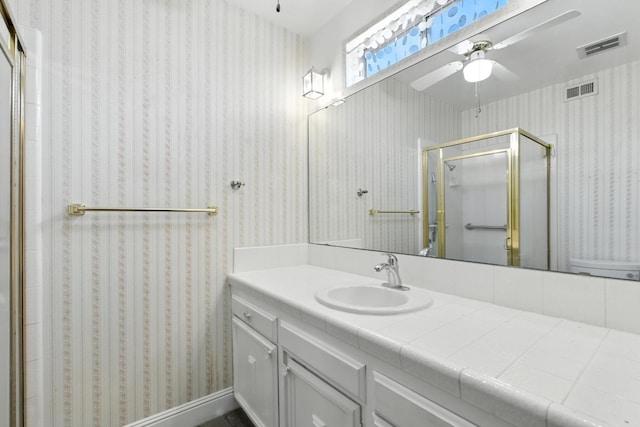 4909 N 7th St Unit S, Fresno, CA 93726 - full bathroom featuring ceiling fan, vanity, and a shower stall