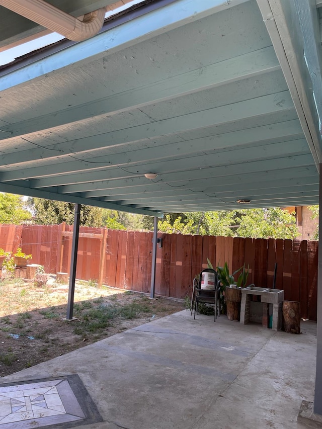 826 N W St, Visalia, CA 93291 - view of patio featuring a carport