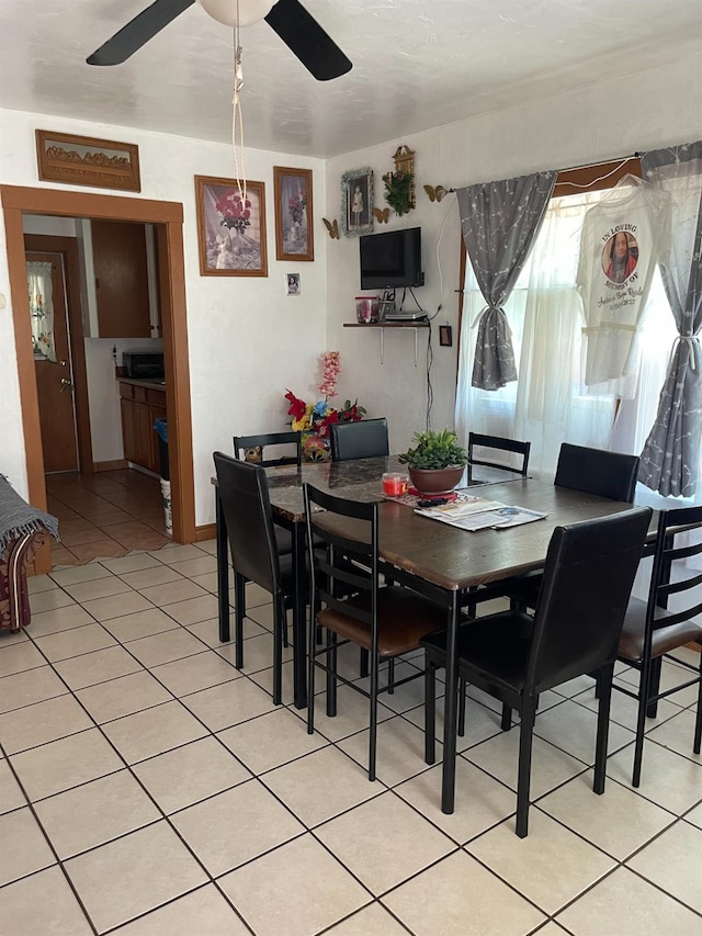 826 N W St, Visalia, CA 93291 - dining space featuring a ceiling fan and light tile patterned flooring