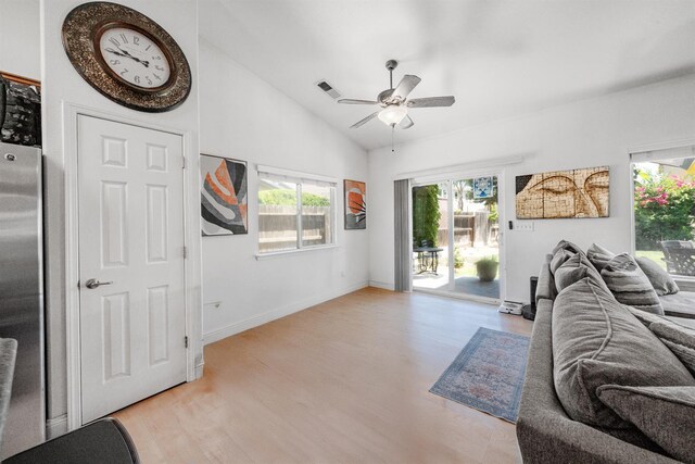 2148 N Ivanhoe Ave, Fresno, CA 93722 - living area featuring lofted ceiling, ceiling fan, and light wood-type flooring