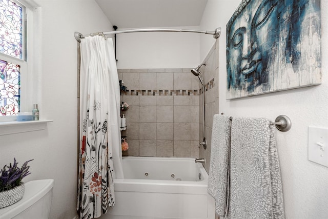 2148 N Ivanhoe Ave, Fresno, CA 93722 - bathroom featuring a combined bath / shower with jetted tub and toilet