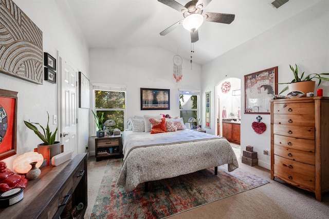 2148 N Ivanhoe Ave, Fresno, CA 93722 - bedroom featuring vaulted ceiling, carpet floors, ceiling fan, and ensuite bathroom