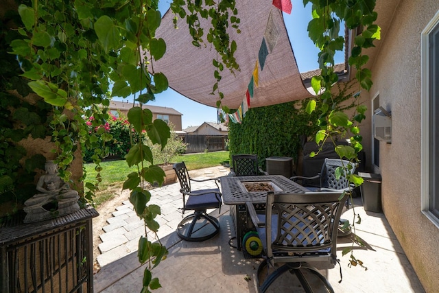 2148 N Ivanhoe Ave, Fresno, CA 93722 - view of patio / terrace featuring an outdoor fire pit