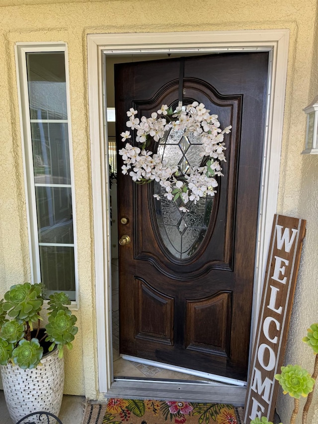 605 W Russell Ave, Visalia, CA 93277 - property entrance featuring stucco siding
