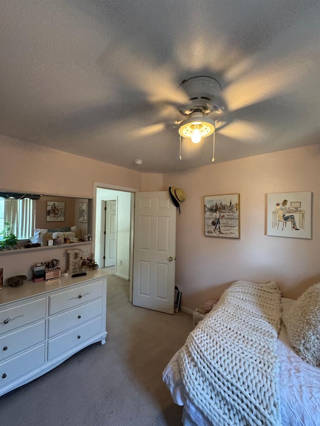 605 W Russell Ave, Visalia, CA 93277 - bedroom with light carpet, a textured ceiling, and ceiling fan