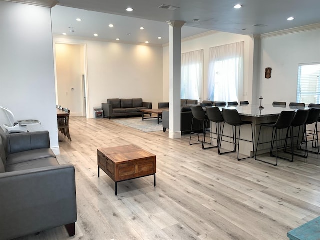 community lobby with ornamental molding and recessed lighting