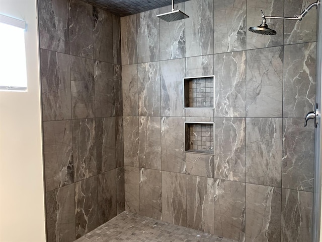 bathroom featuring tiled shower
