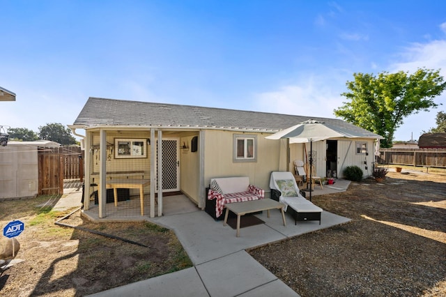242 Hamlet St, Lemoore, CA 93245 - view of front of home with a fenced backyard and a patio area