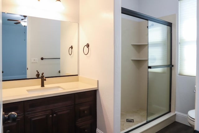 4249 N Waterside Dr, Clovis, CA 93619 - full bath featuring a shower stall, a ceiling fan, and vanity