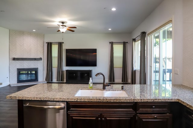 4249 N Waterside Dr, Clovis, CA 93619 - kitchen with dishwasher, open floor plan, a ceiling fan, light stone countertops, and recessed lighting