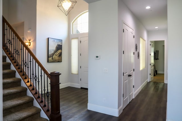 4249 N Waterside Dr, Clovis, CA 93619 - entrance foyer featuring dark wood-style flooring, stairway, and recessed lighting