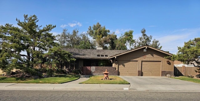 1 Adams Dr, Chowchilla, CA 93610 - ranch-style house with a garage, concrete driveway, a chimney, and brick siding