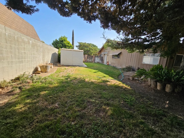 1 Adams Dr, Chowchilla, CA 93610 - fenced backyard with a shed