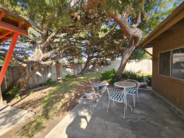 1 Adams Dr, Chowchilla, CA 93610 - fenced backyard with a patio