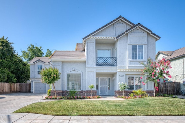 1224 Oak Ave, Clovis, CA 93611 - view of front of home with a tiled roof, concrete driveway, a garage, and stucco siding