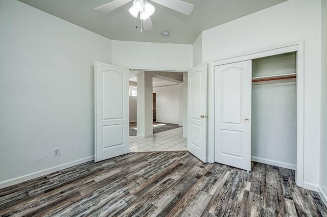 1224 Oak Ave, Clovis, CA 93611 - unfurnished bedroom with wood finished floors, a closet, and ceiling fan