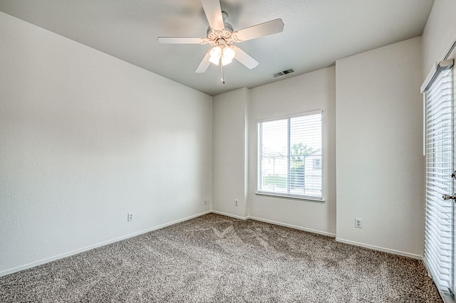1224 Oak Ave, Clovis, CA 93611 - carpeted empty room with healthy amount of natural light and ceiling fan