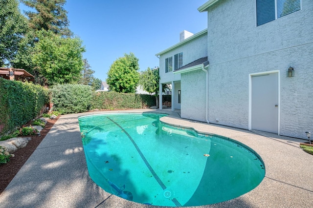 1224 Oak Ave, Clovis, CA 93611 - view of swimming pool featuring a fenced backyard