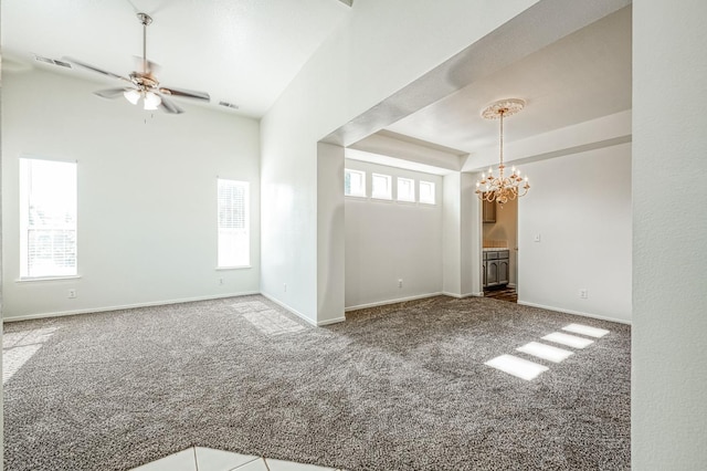 1224 Oak Ave, Clovis, CA 93611 - unfurnished living room with carpet, a ceiling fan, a chandelier, and lofted ceiling