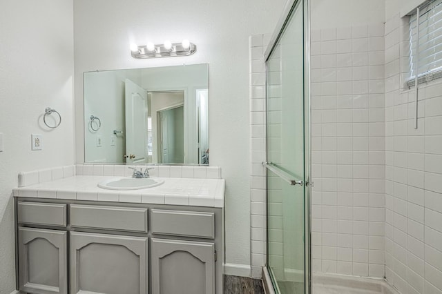 1224 Oak Ave, Clovis, CA 93611 - full bathroom featuring a shower stall and vanity