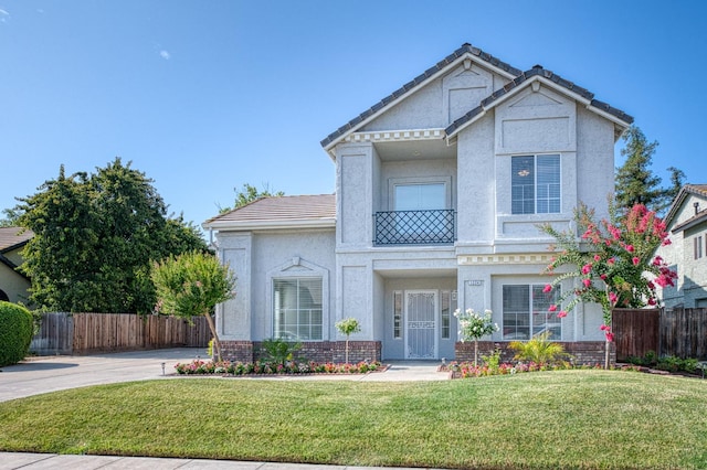 1224 Oak Ave, Clovis, CA 93611 - view of front of home with brick siding, stucco siding, and a tile roof