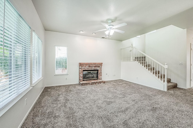 1224 Oak Ave, Clovis, CA 93611 - unfurnished living room with stairway, a ceiling fan, carpet floors, and a fireplace