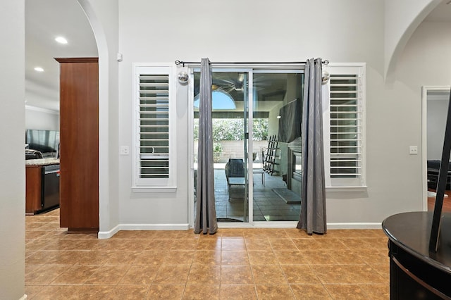 17024 Granite Falls Way, Chowchilla, CA 93610 - dining area with arched walkways and recessed lighting