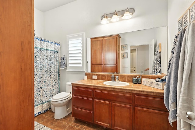 17024 Granite Falls Way, Chowchilla, CA 93610 - full bath with tile patterned flooring, vanity, and a shower with curtain