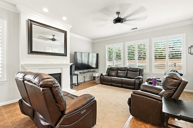 17024 Granite Falls Way, Chowchilla, CA 93610 - living area featuring ceiling fan, crown molding, healthy amount of natural light, a fireplace, and recessed lighting