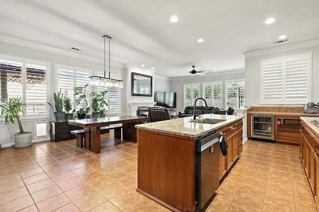 17024 Granite Falls Way, Chowchilla, CA 93610 - kitchen with wine cooler, stainless steel dishwasher, ornamental molding, recessed lighting, and brown cabinets